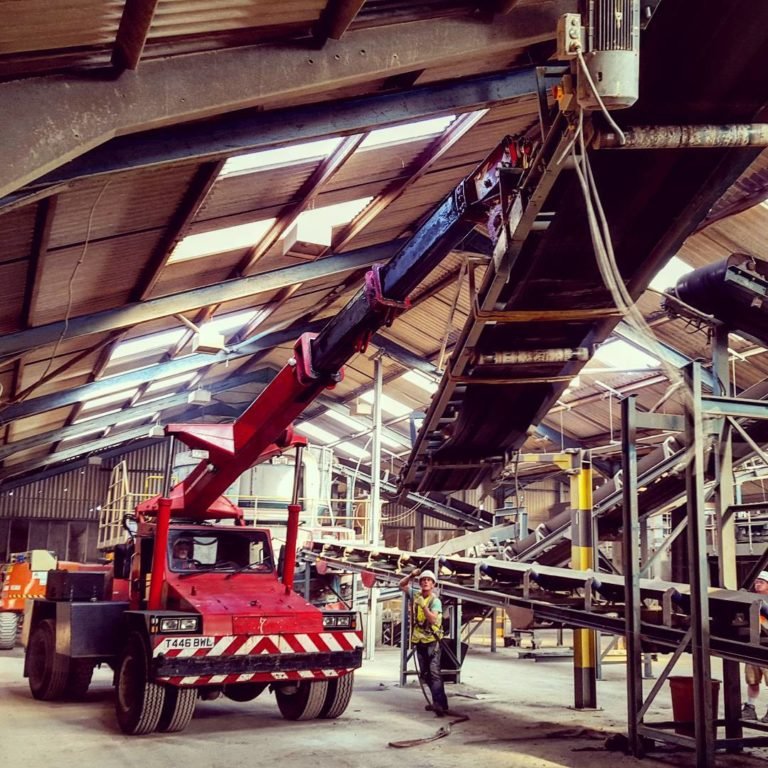 Franna pick and carry crane inside the brickworks during the factory relocation