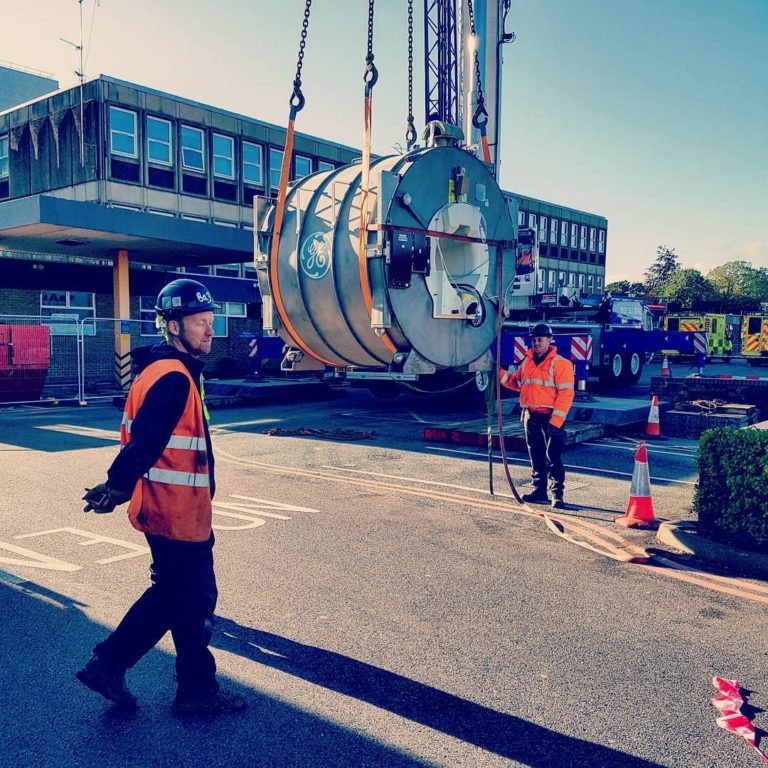 MRI scanner on the crane hook outside Darlington Memorial Hospital