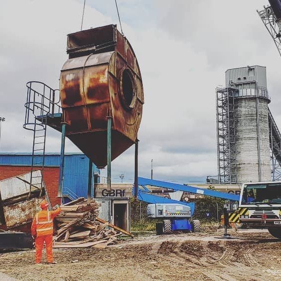 Mobile crane lifting down a section of the batching plant at the Port of Tyne