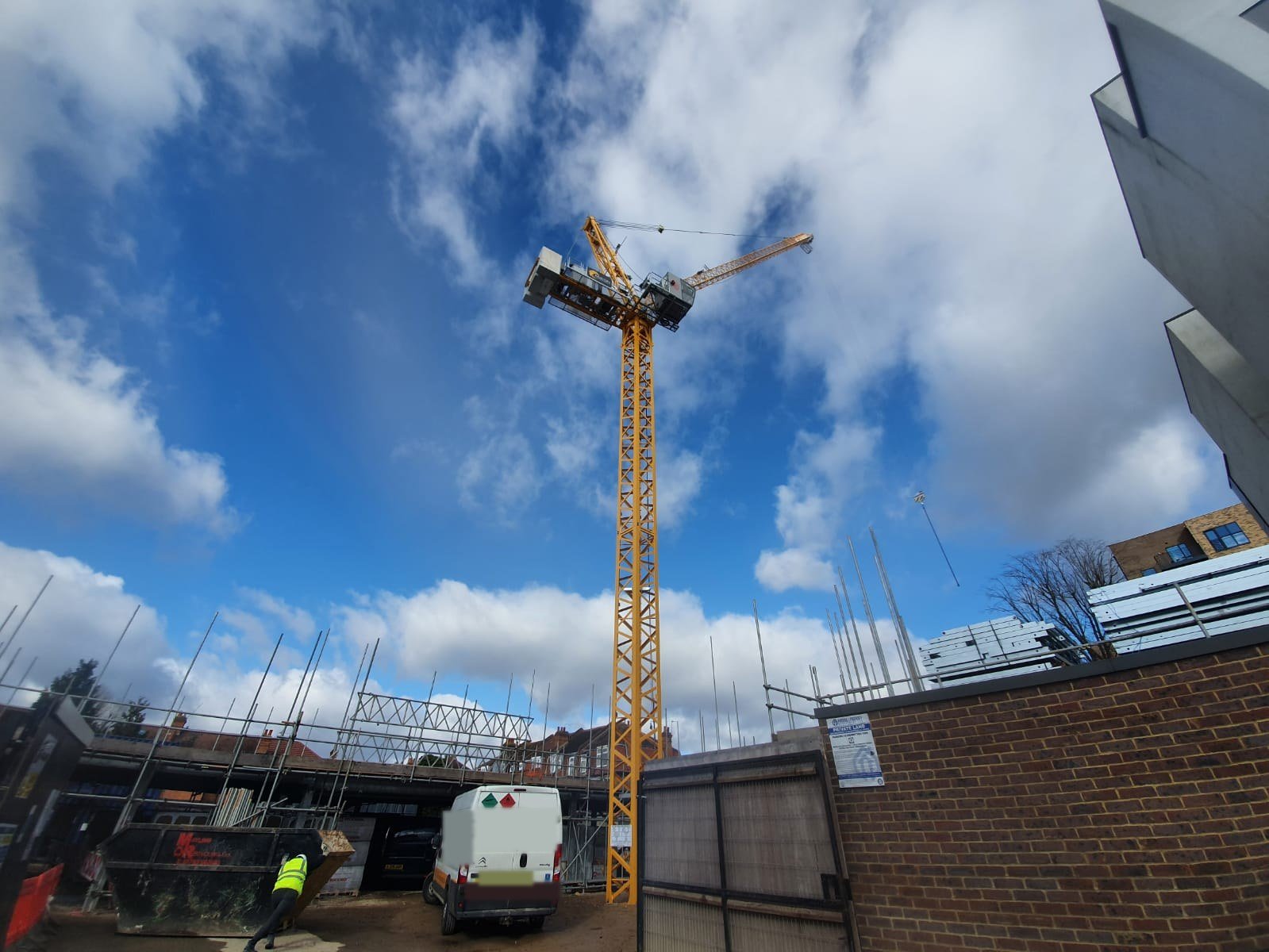 The Jaso J80PA tower crane standing over the first floor steel and scaffold on the hotel site at Lampton Road, Hounslow