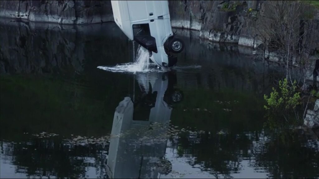 Van lifted out of the lake at Greenfoot Quarry by our 50te crane, in a scene from ITV's Vera